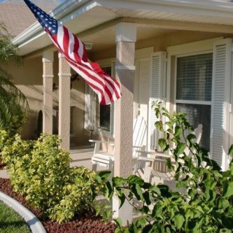 Colonial Shutters on a South Florida home for hurricane protection