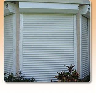 Aluminum Roll Down Shutters on side of house | Alufab USA